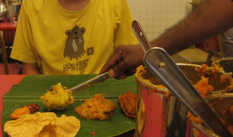 Serving in a typical South Indian restaurant