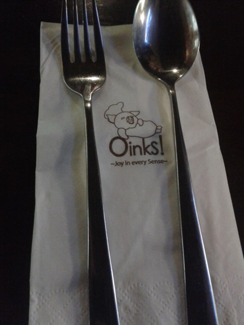 the logo of oink