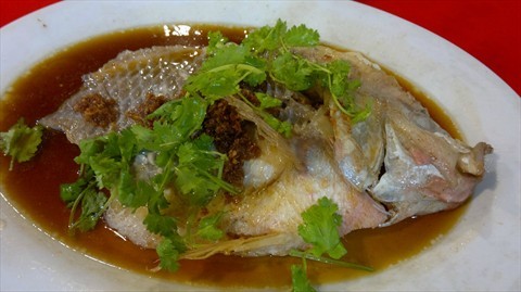 Steamed fish in soya sauce.