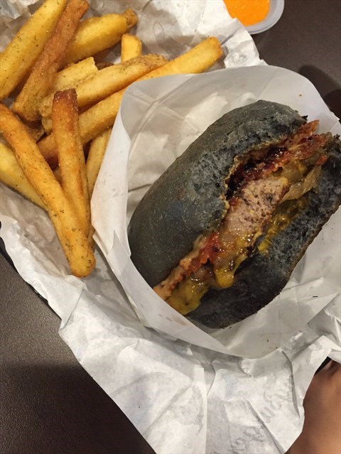 A Cheddar Beef patty topped with deep fried Portobello Mushrooms, Honey Mustard and a Sunny Side Up.