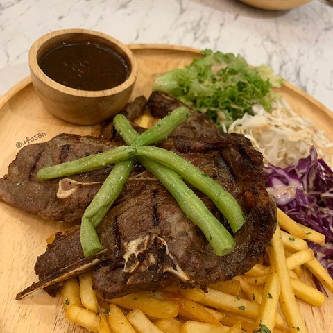 Marinated  lamb  shoulder,  served  with  fries  and  salad.  #timeline  #lambchop