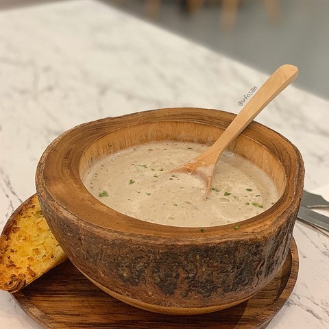 Chef’s  recipe  mushroom  soup  served  with  a  piece  of  garlic  bread  and drizzle  with  truffle  oil.  #musttry  #mushroomsoup  #timeline